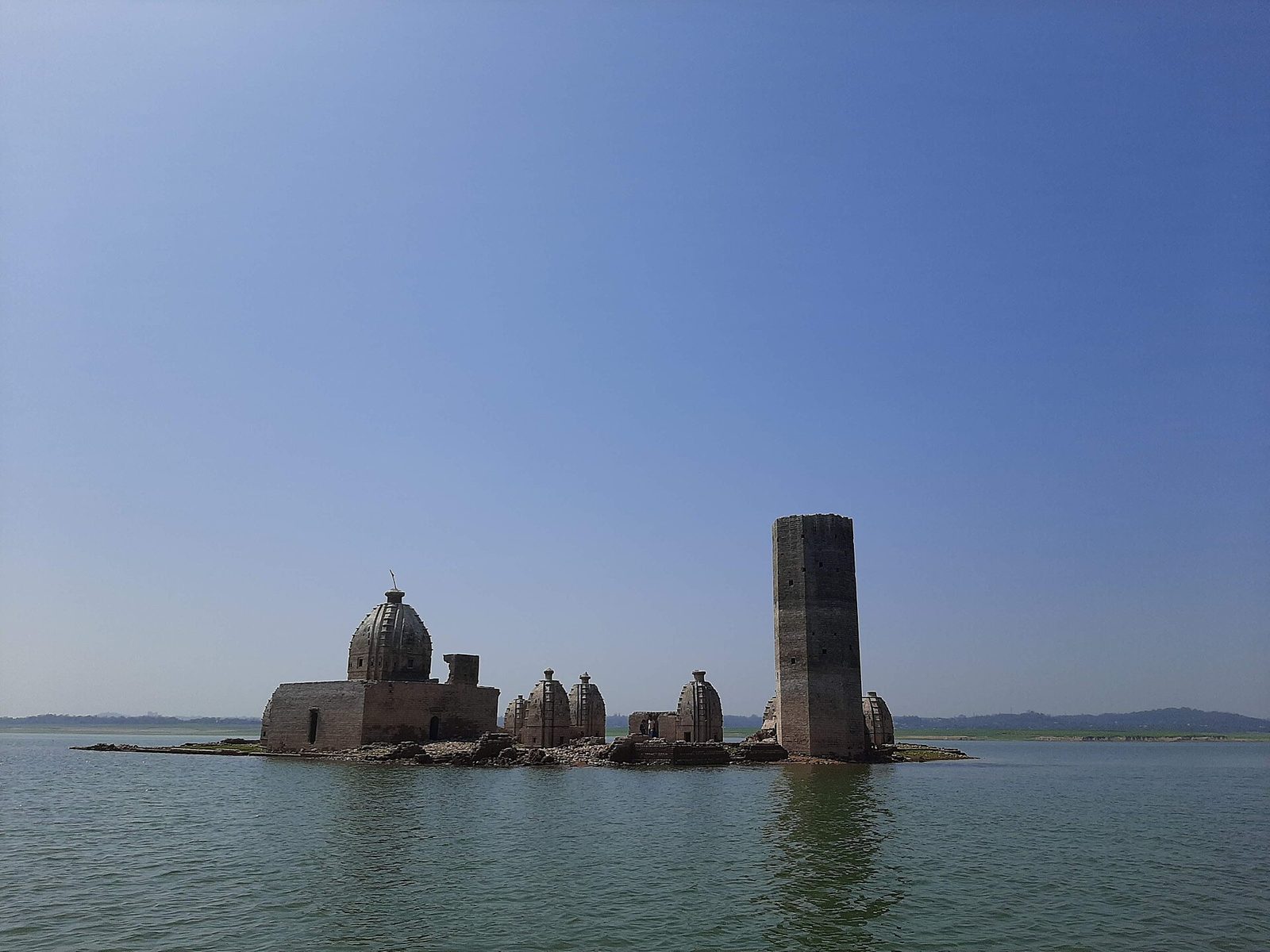 Bathu Ki Ladi temples rising from the Maharana Pratap Sagar lake